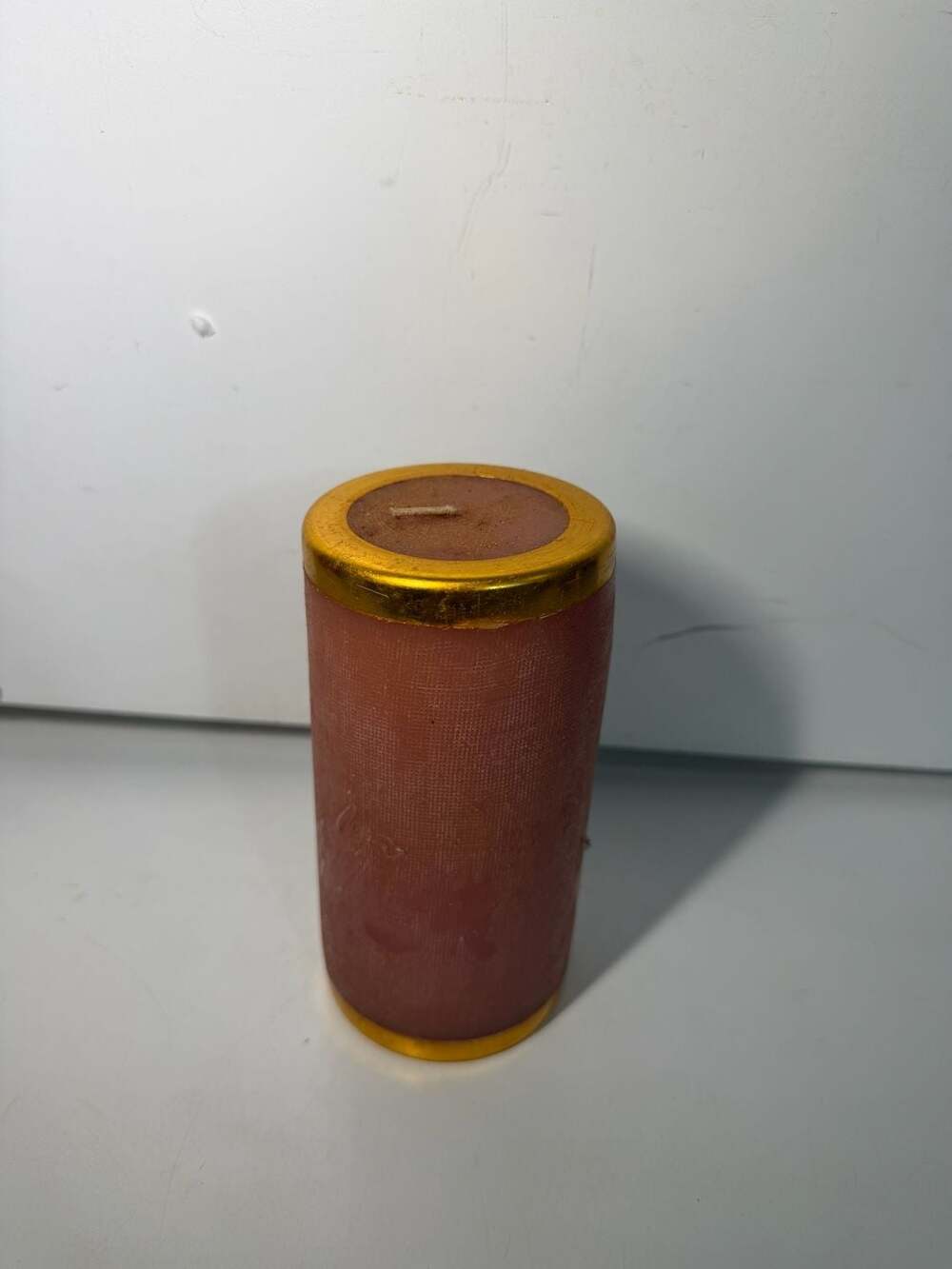 Unbranded Pillar Candle with Textured Red Wax and Gold Trim